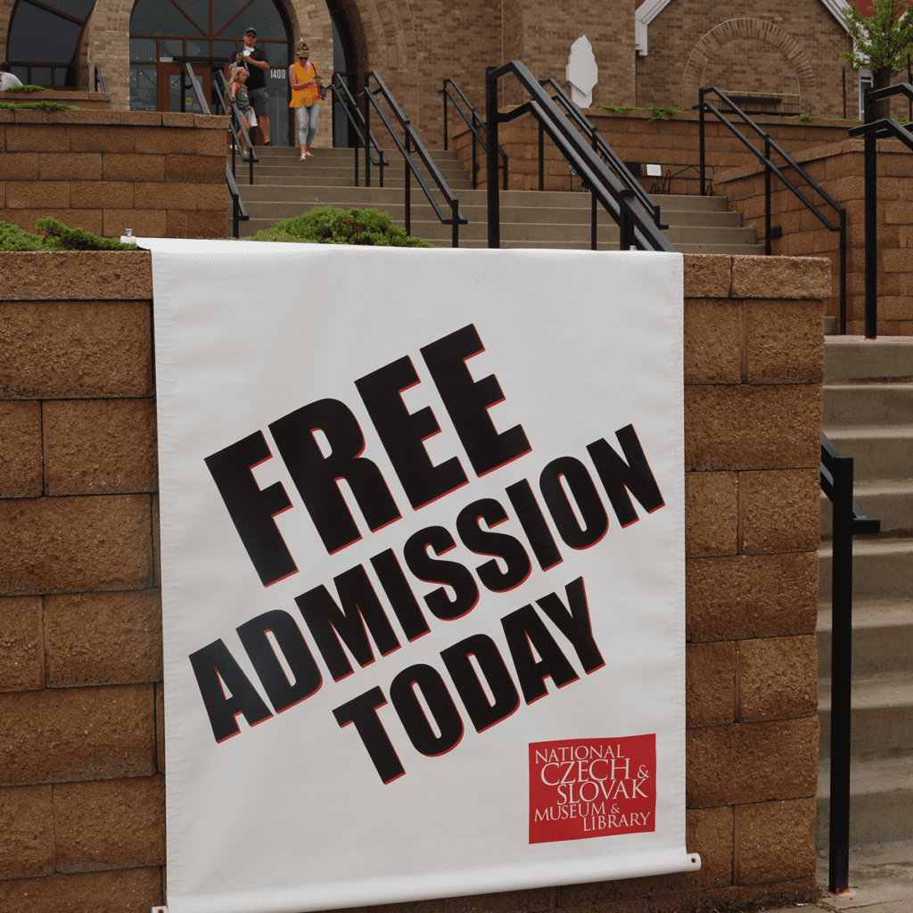 Free admission today sign